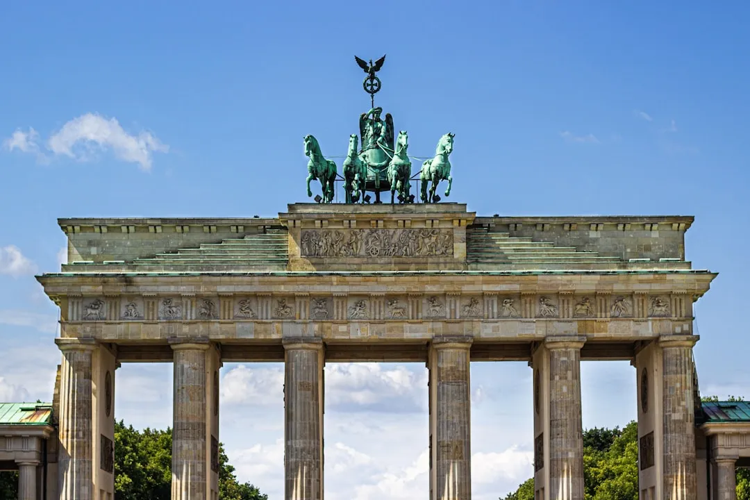 Berlin's Brandenburg Gate and Major Transit Hubs (Image Credits: Unsplash)